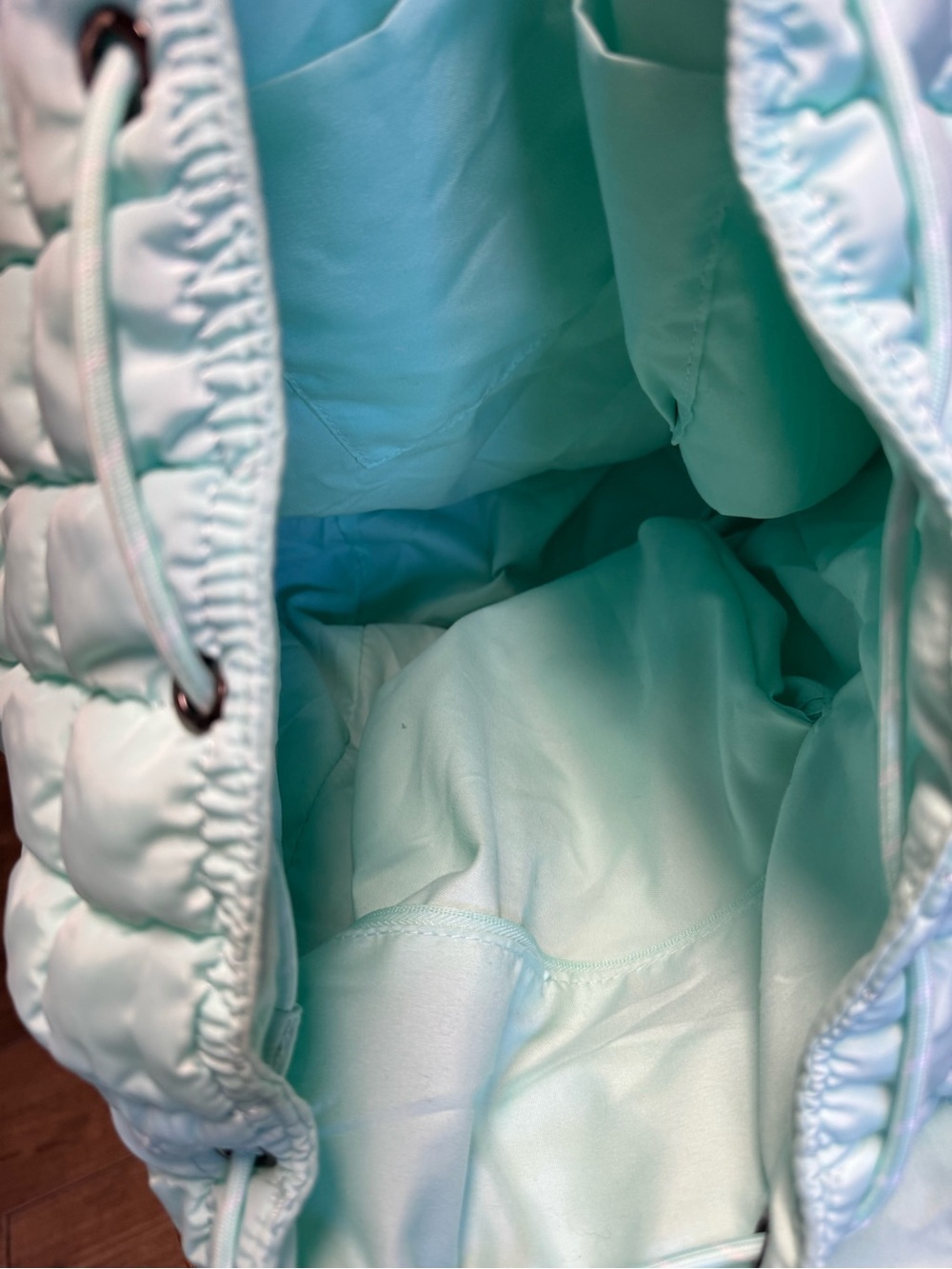 Iris Puff Backpack by Iris & Rainbow features a mint green quilted puffer design - Picture 2 of 7